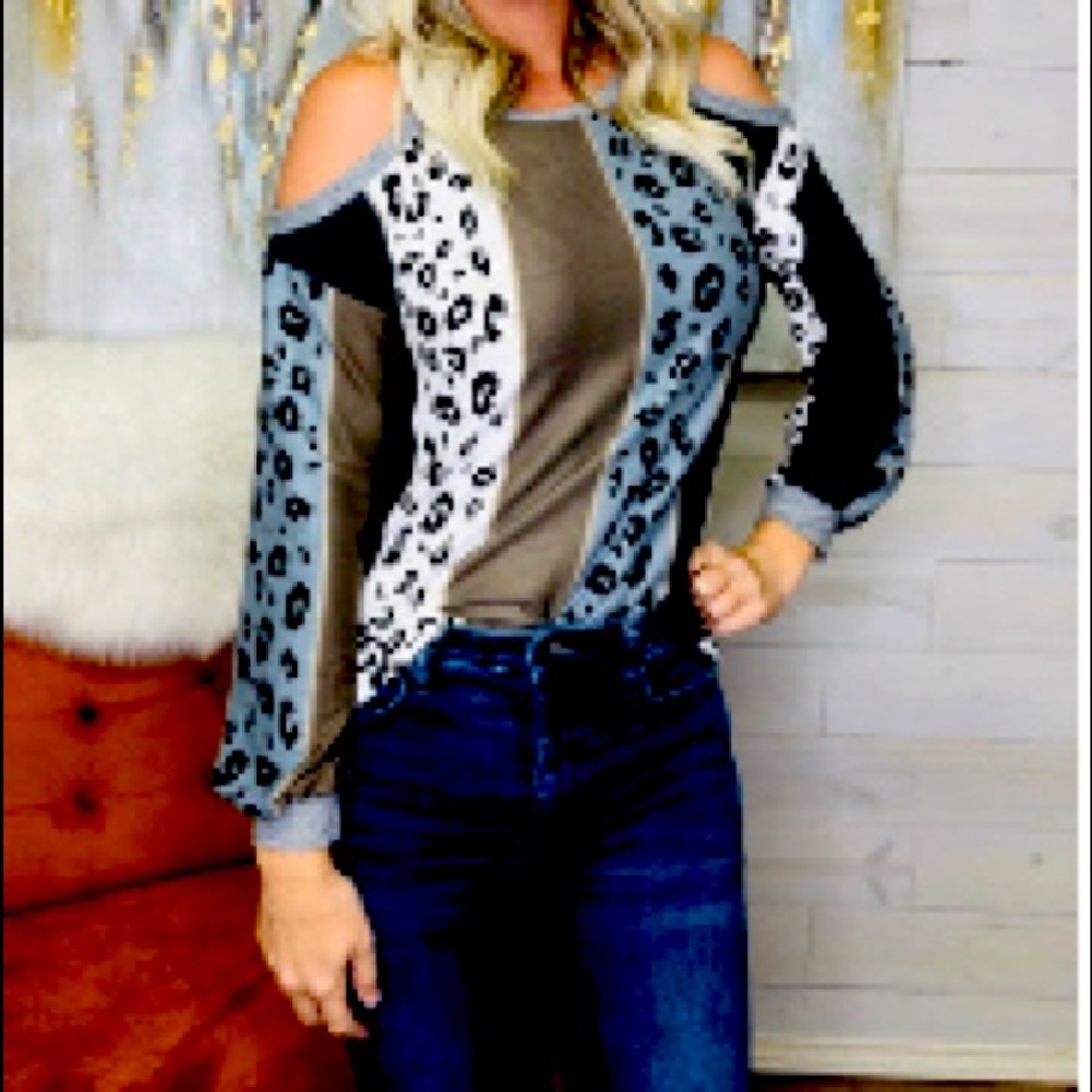 Off shoulder multiple colors/animal print sweater